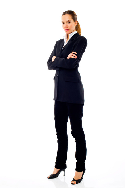 Young businesswoman standing with arms crossed - Фото, зображення