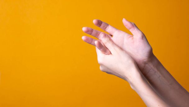 woman holds her hand - pain concept - Фото, зображення