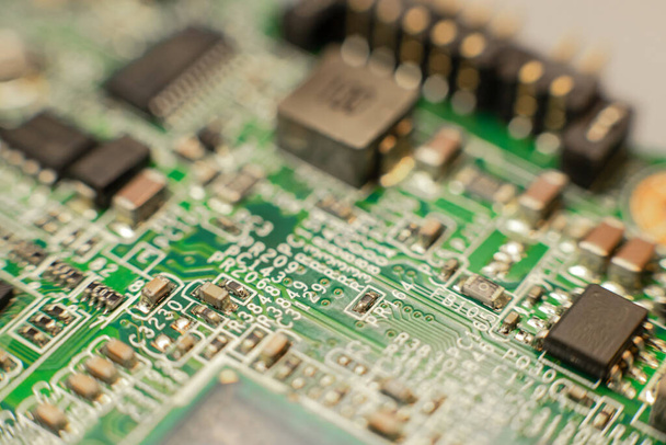 A closeup shot of a computer chip, an integrated circuit - Фото, изображение