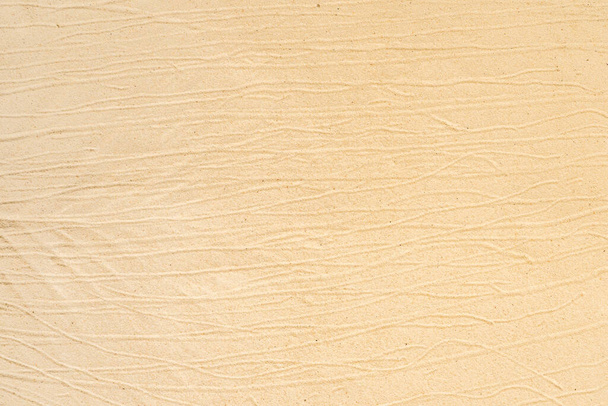 A top view of sand with lines on it - Zdjęcie, obraz