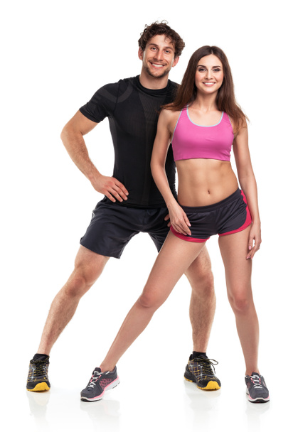 Atletico uomo e donna dopo l'esercizio di fitness sulla schiena bianca
 - Foto, immagini