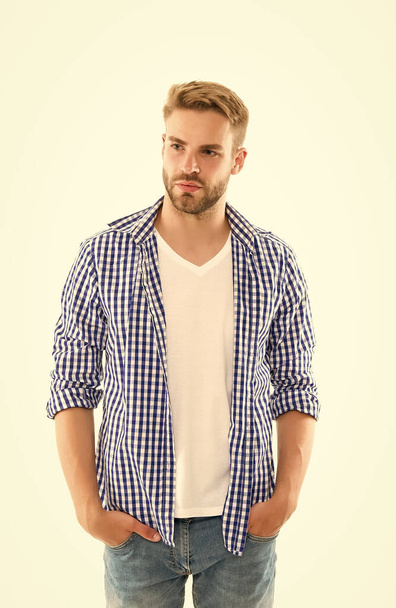 handsome young man wear checkered shirt. casual male fashion style. unshaven guy has groomed hair isolated on white background. hairdresser service concept. skin and hair care - Φωτογραφία, εικόνα