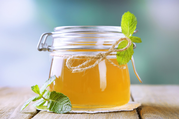 Homemade mint jelly in glass jar - Фото, зображення