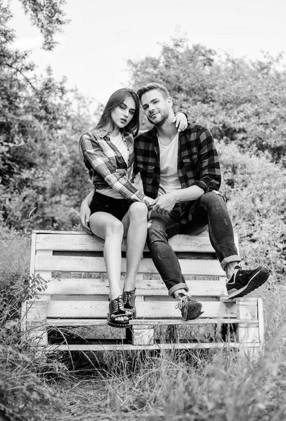 Only love can warm us. family weekend. romantic date. man with girl in park. couple relax outdoor on bench. Love. happy valentines day. summer camping in forest. couple in love. Checkered fashion - Foto, Bild