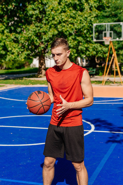 Basketball player jump shooting and playing basketball. - Фото, изображение