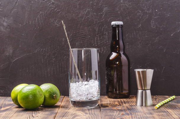 Ingredients for making a cocktail on a wooden table. Bar. - Photo, image