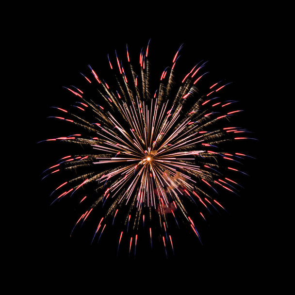 Colorful fireworks isolated on black sky background. - Foto, Imagen