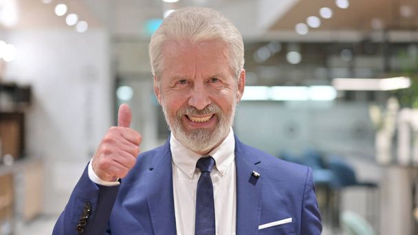 Portrait of Successful Old Businessman showing Thumbs Up - Photo, Image