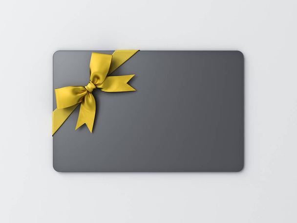 Üres fekete ajándék kártya arany szalaggal íj elszigetelt fehér háttér árnyék minimális koncepció 3D renderelés - Fotó, kép