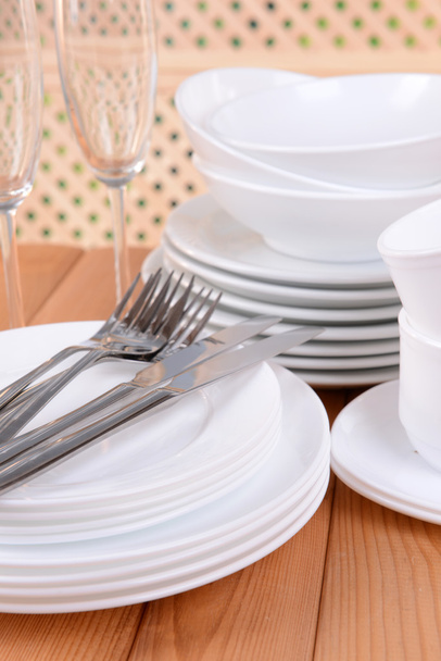 Set of white dishes - Фото, изображение