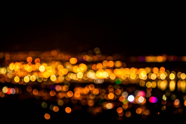 Bokeh effect bij nachtelijke stadsverlichting - Foto, afbeelding