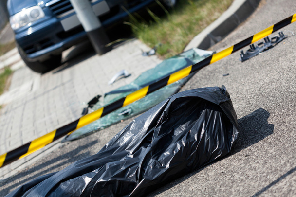 Corpse in bag after car accident - Photo, Image