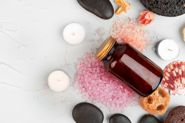 Beautiful composition with cosmetic bottles and spa decorations - 写真・画像