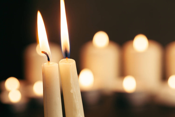 Candle flame close up on a black background - Fotó, kép