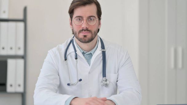 Portrait of Young Doctor Looking at Camera - Fotoğraf, Görsel