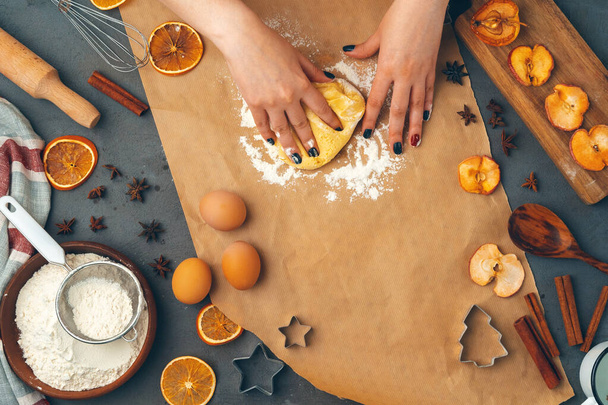 Womans hands preparing dough for cookies close up - Фото, изображение