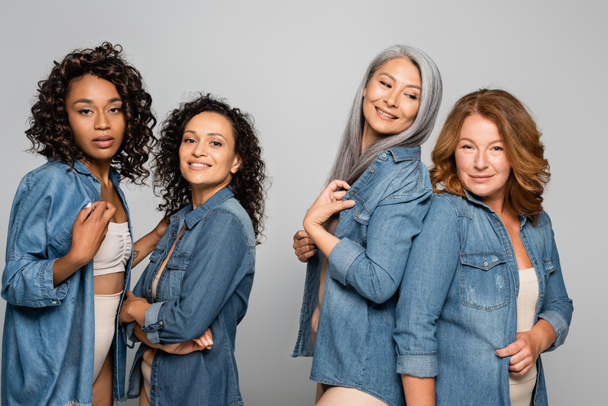 Multicultural women in lingerie and denim shirts isolated on grey, body positive concept - Fotoğraf, Görsel