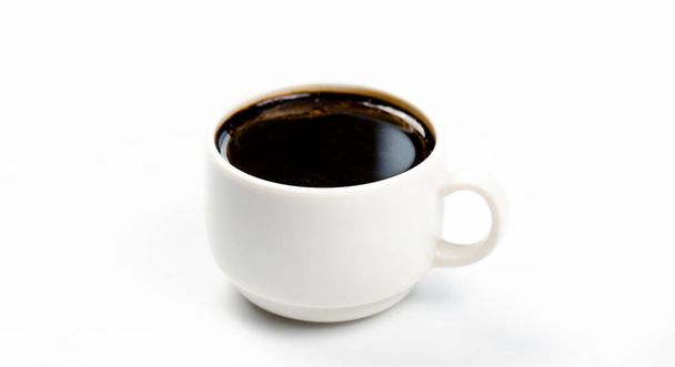 A cup of coffee. Espresso. On the table. On white background. - Foto, Imagem