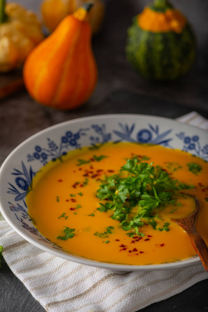 Delicious sweet soup with chilli and herbs - Fotó, kép