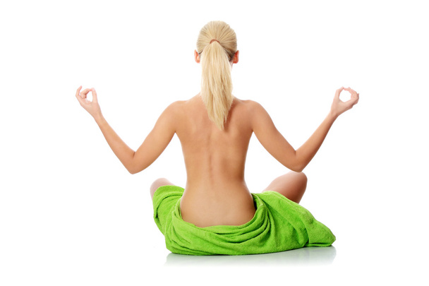 Woman doing yoga exercise - Fotó, kép