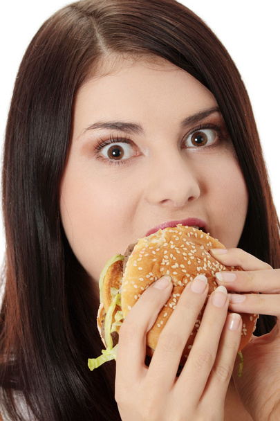Woman eating hamburger - Foto, Imagem