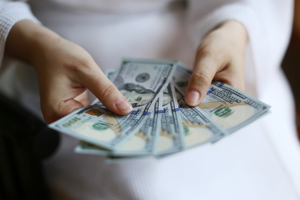 Woman hands holding money - Foto, Imagen