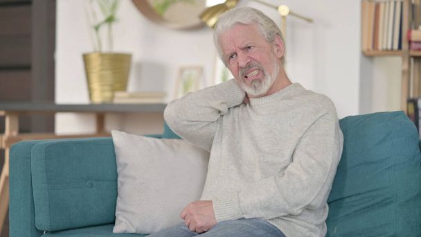 Exhausted Senior Old Man having Neck Pain at Home - Photo, Image