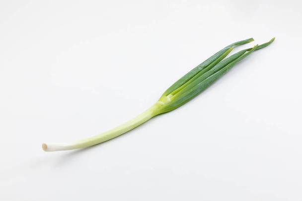 green spring onion, white background - Foto, imagen