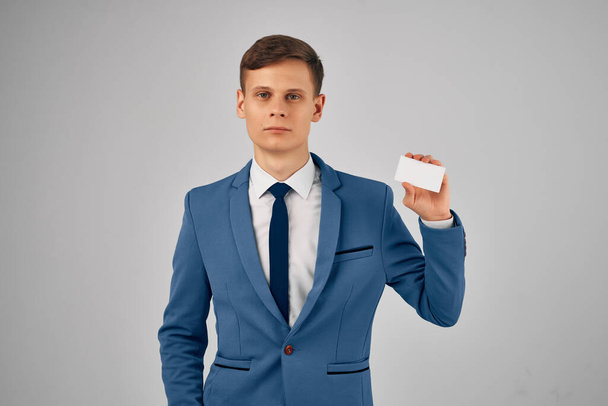 a man in a suit with a business card in his hands an identity card Copy Space professional - Photo, Image