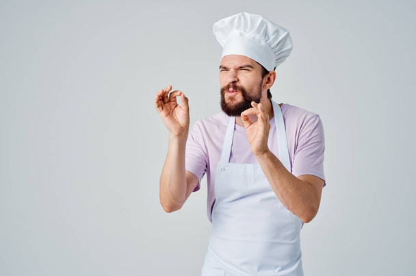 maschio chef in uniforme walkie-talkie professionale ristorante luce sfondo - Foto, immagini