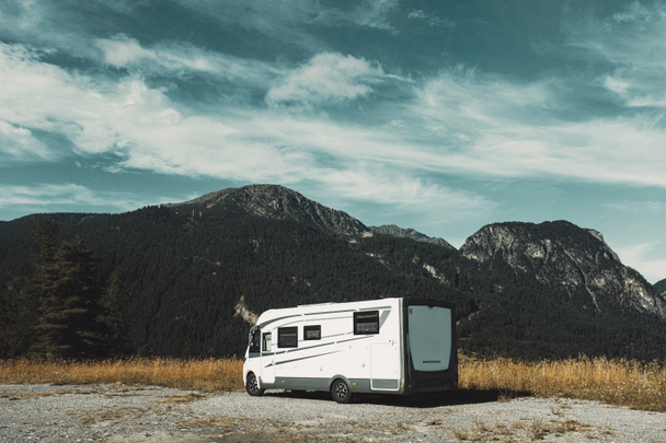 Motorhome camper vehicle for transport on mountains background - Photo, Image