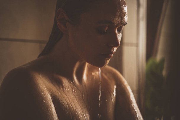 lifestyle moments of a young woman at home. Woman taking a shower in the morning - Foto, Bild