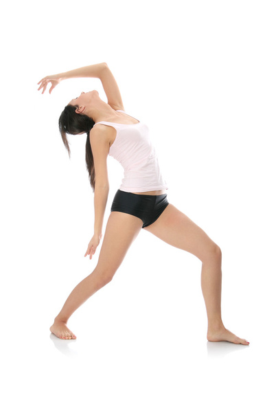 Young woman doing exercise - Fotografie, Obrázek