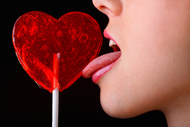 Red lollipop heart - Фото, изображение