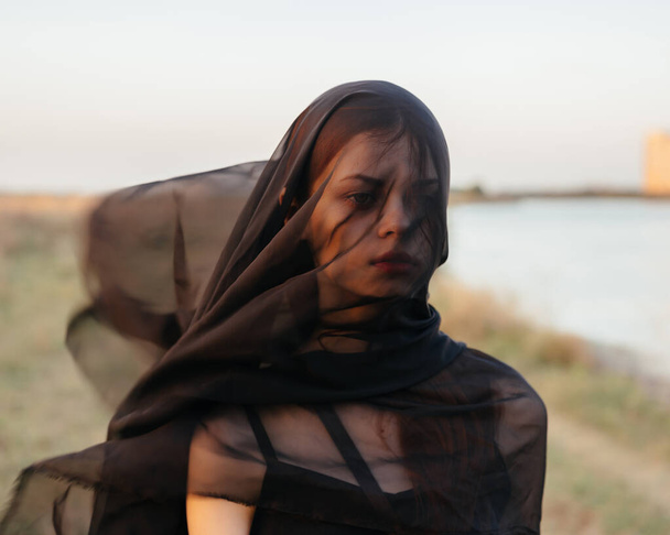 woman in black veil outdoors travel fashion fresh air - Valokuva, kuva