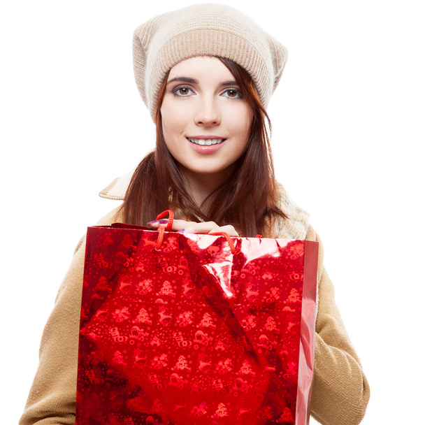 girl holding red shopping bag - Foto, Bild