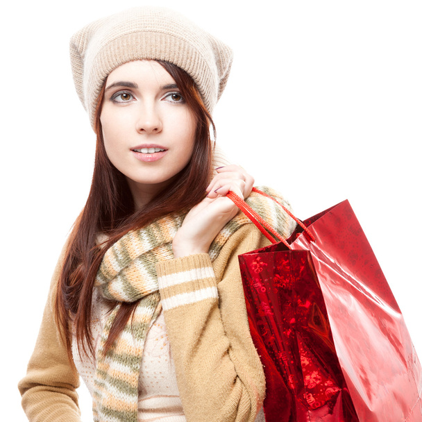 girl holding red shopping bag - Foto, immagini