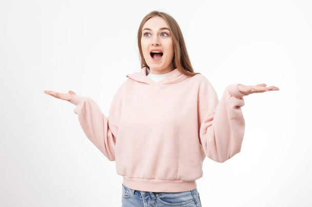 Portrait of young surprised woman isolated on white background - Φωτογραφία, εικόνα