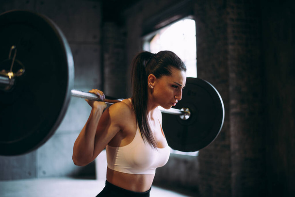 beautiful woman training and making functional workout in the gym - Fotografie, Obrázek