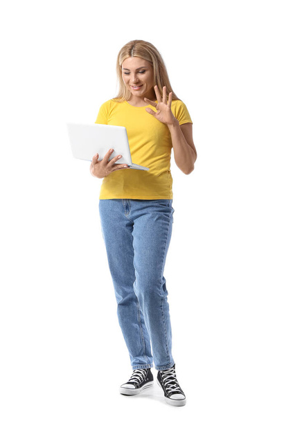 Woman with laptop on white background - Foto, Bild