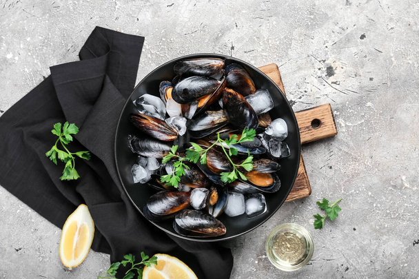 Composition with raw mussels on grunge background - Photo, Image