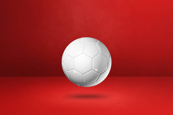 White soccer ball isolated on a red studio background. 3D illustration - Фото, изображение
