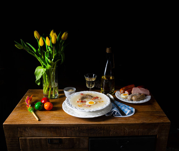 breakfast with a cup of tea and eggs on a black background - Fotografie, Obrázek