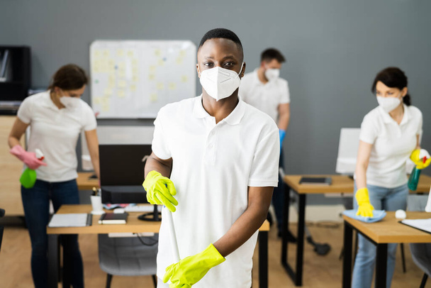 Cleaning Janitor Team Cleaner Group In Face Mask - Foto, imagen