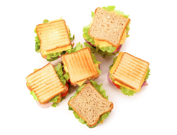 Sabrosos sándwiches sobre fondo blanco - Foto, Imagen