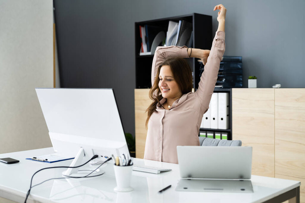 Woman Stretching At Office Desk. Worker Stretch Workout - Zdjęcie, obraz
