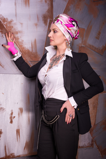 Woman in suit against metal background - Fotografie, Obrázek