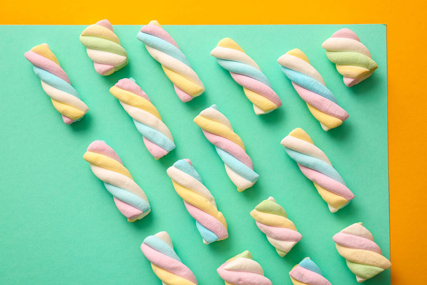 Tasty marshmallows on color background - Фото, изображение