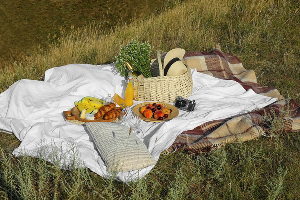 Tasty food and drink for romantic picnic outdoors - Foto, imagen