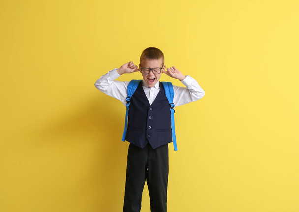 Stressed pupil on color background - Foto, immagini